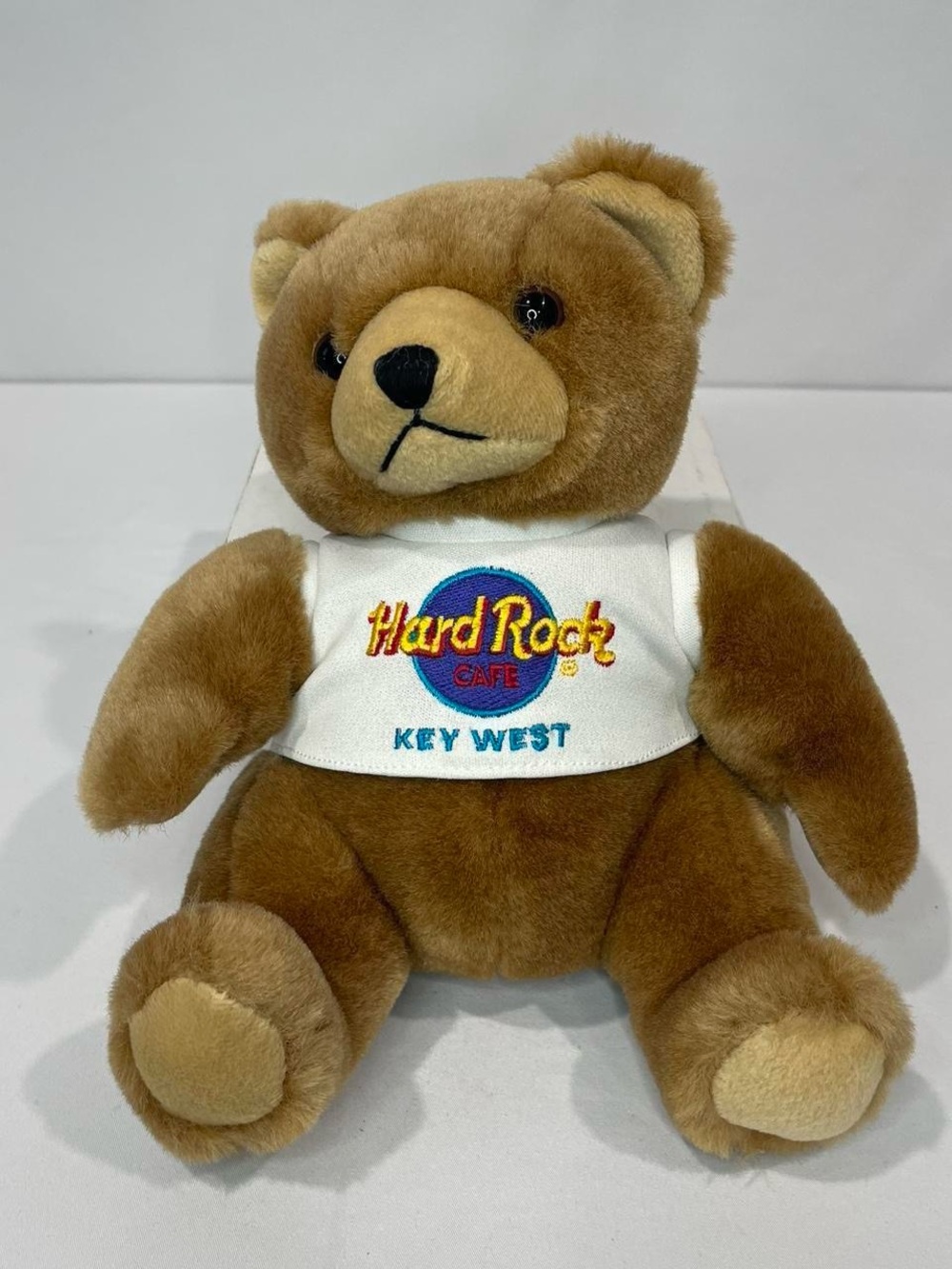 Hard Rock Cafe brown plush bear with white logo tee